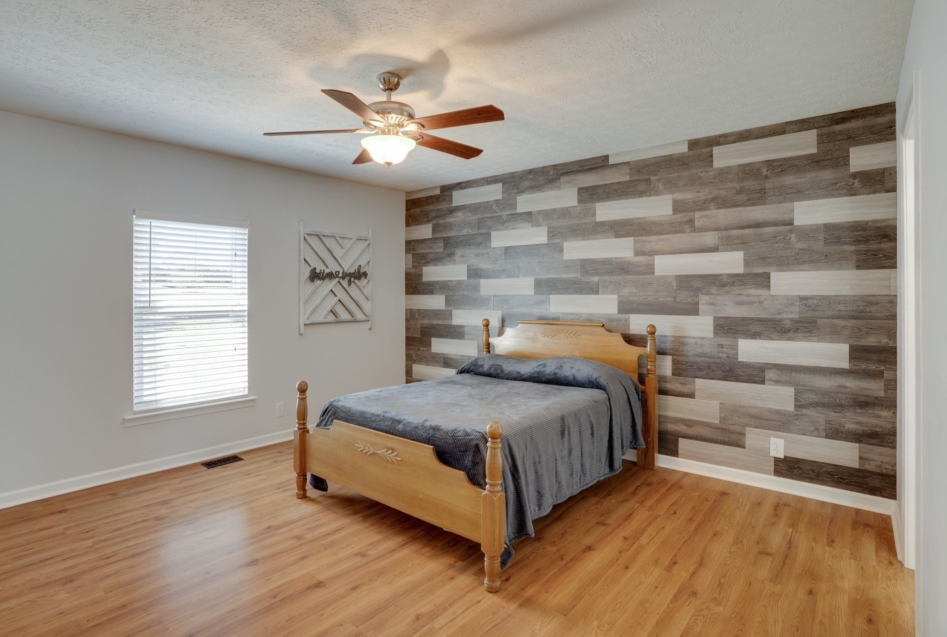 145 South Palmers Chapel Road White House, TN 37188 - Photo 9 of 30 a bedroom with a bed and a chandelier