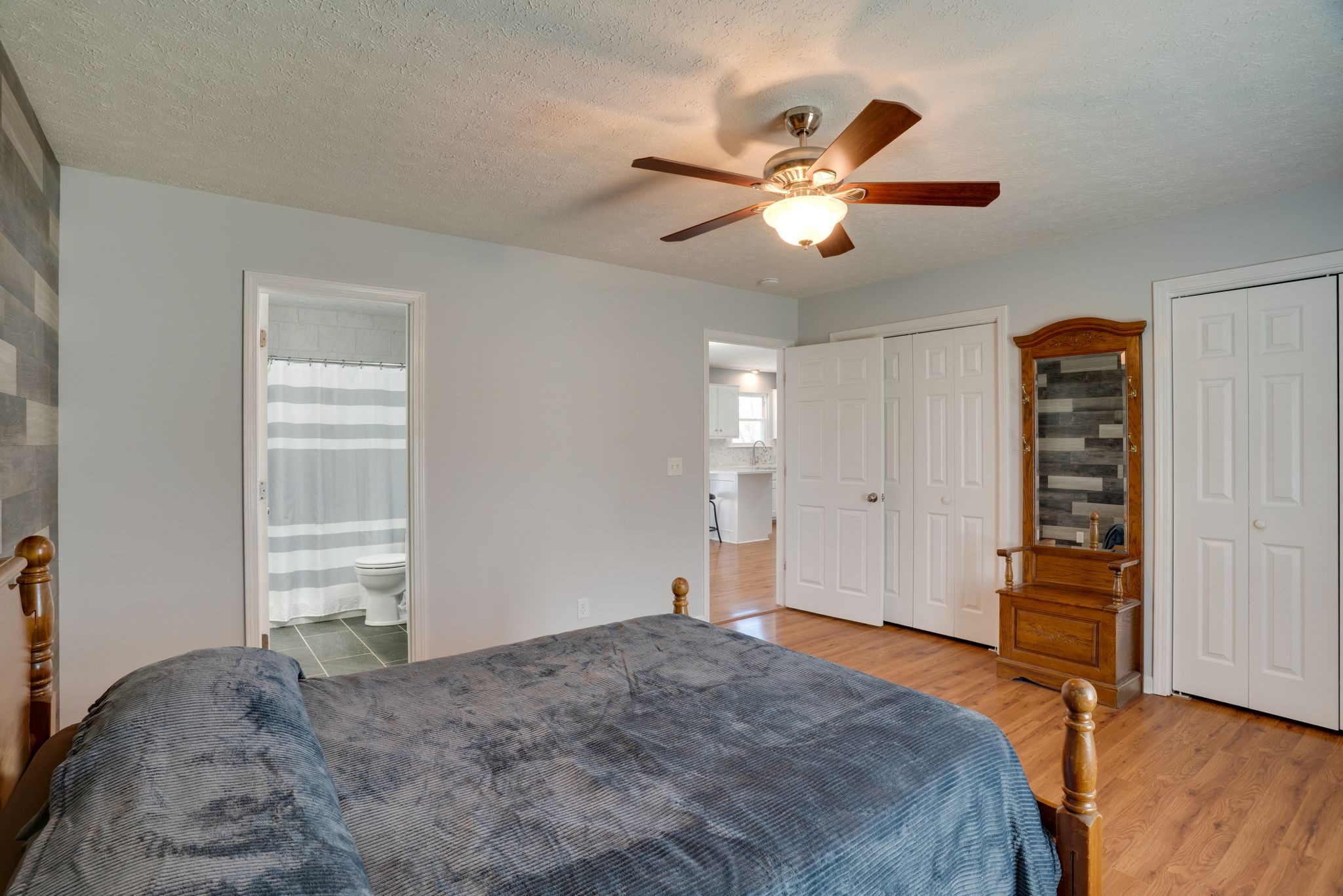 145 South Palmers Chapel Road White House, TN 37188 - Photo 10 of 30 a bedroom with a bed and a chandelier