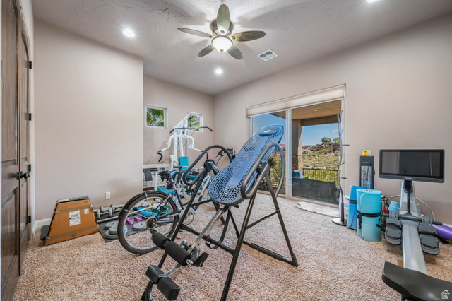2376 Stone Crest Circle St. George, UT 84790 - Photo 43 of 61 Exercise area featuring a ceiling fan, recessed lighting, carpet floors, and plenty of natural light