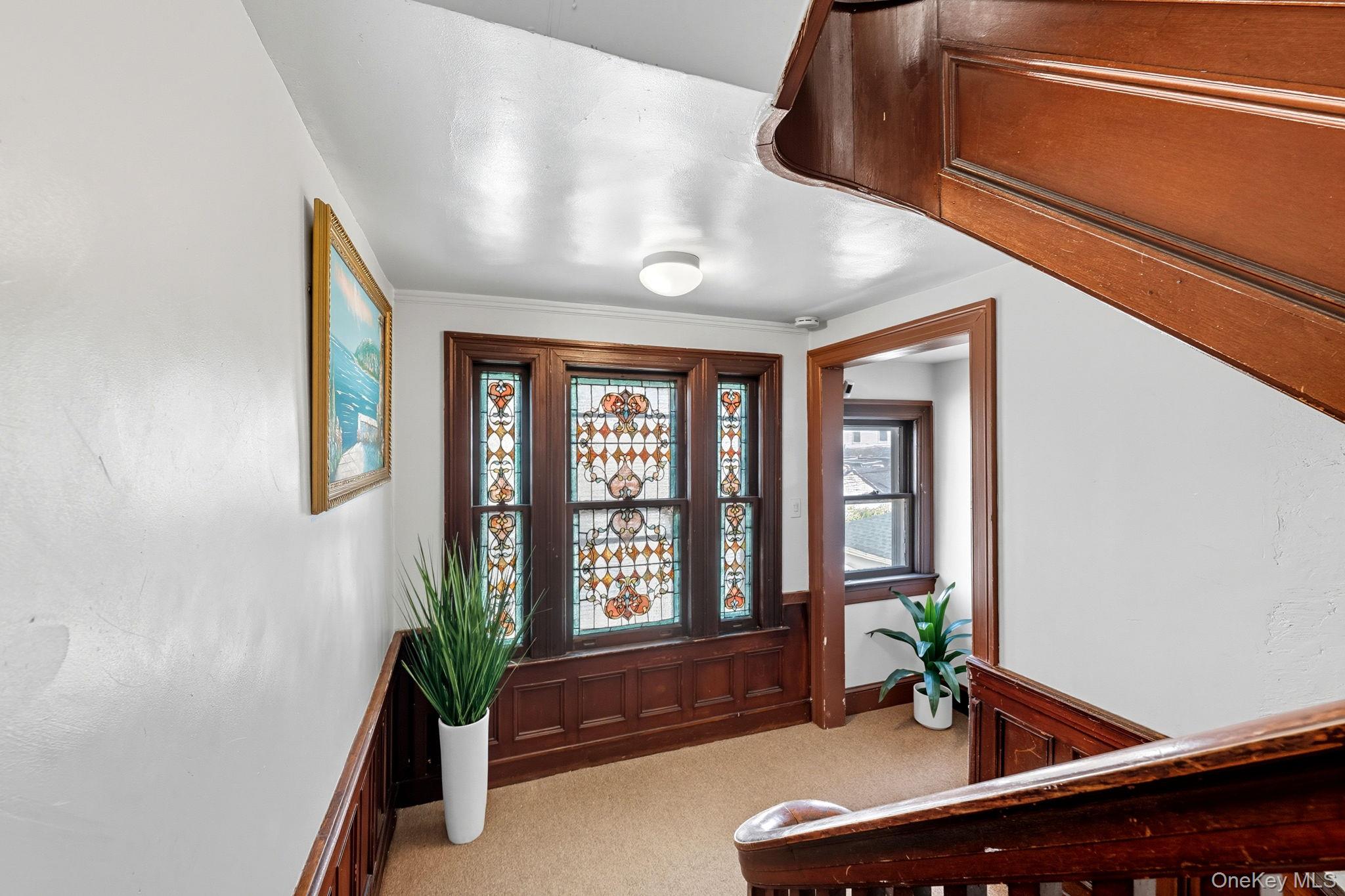165 Park Avenue, Unit 2 Mount Vernon, NY 10550 - Photo 18 of 20 a living room with furniture potted plant and windows