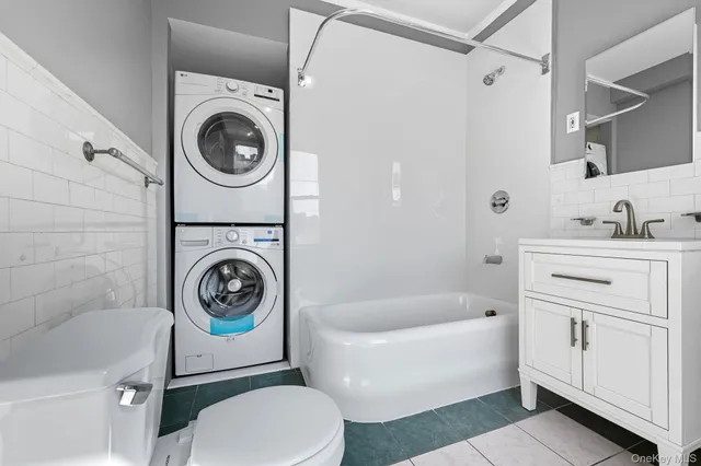 a bathroom with a sink a toilet and a bathtub