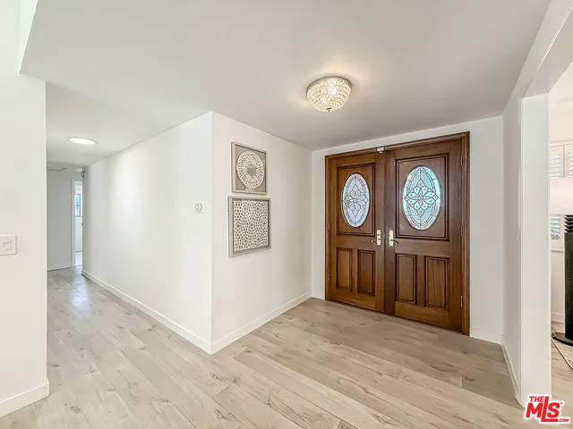 a view of a hallway with elevator