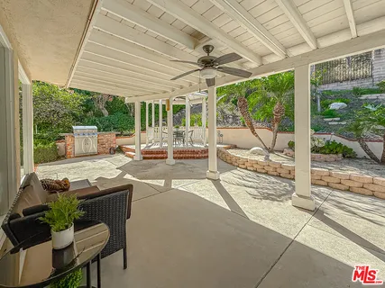 a outdoor space with patio the couches and pool