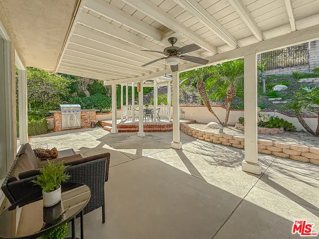a outdoor space with patio the couches and pool