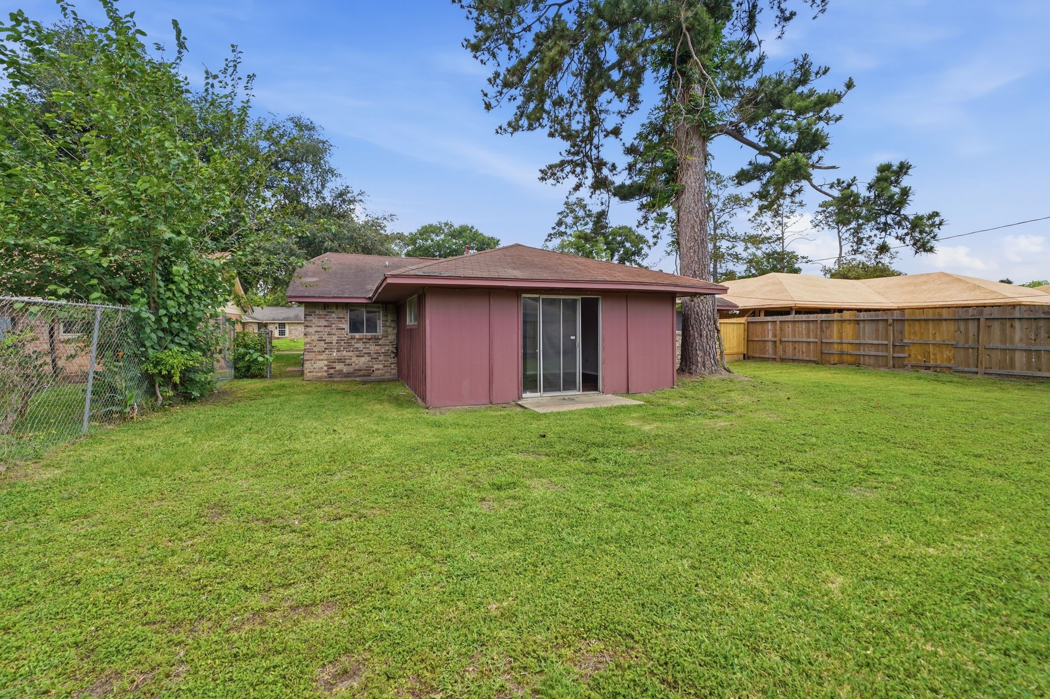 6410 Hopper Road Houston, TX 77016 - Photo 26 of 28 a front view of a house with garden