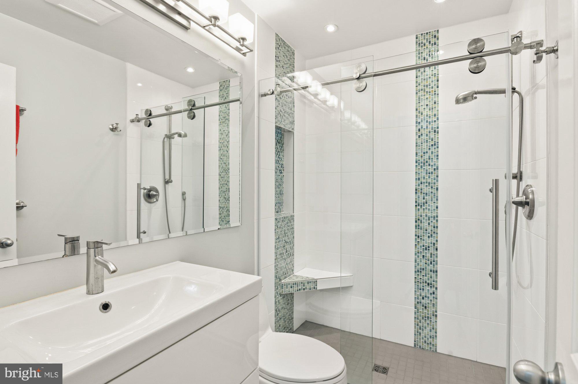 7264 Evans Mill Road McLean, VA 22101 - Photo 15 of 33 Remodeled hall bathroom