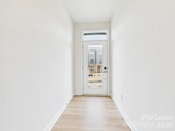 a view of a bedroom from the hallway