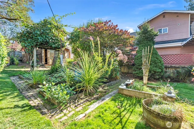 a backyard of a house with lots of green space