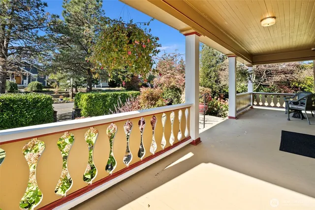 a view of balcony with furniture