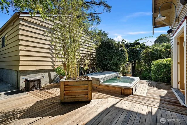 a view of a patio with couches and pool