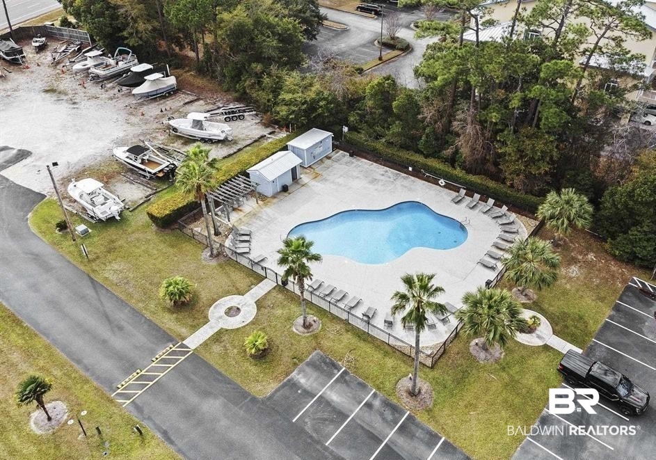 25861 Canal Road, Unit 77 Orange Beach, AL 36561 - Photo 8 of 48 Aerial overview of property's location featuring a pool