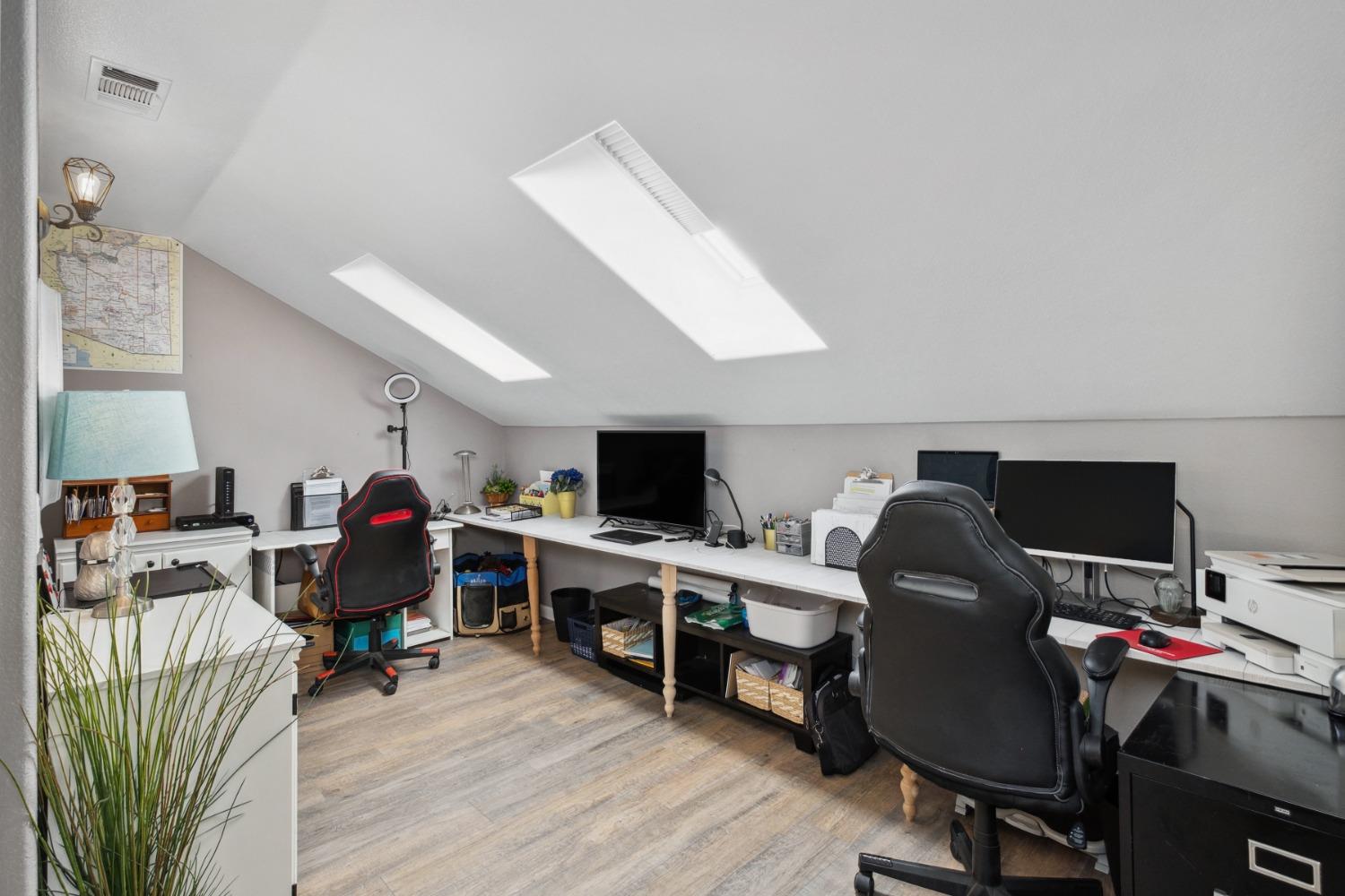 452 Omaha Avenue Clovis, CA 93619 - Photo 18 of 33 a view of a workspace with furniture and a window