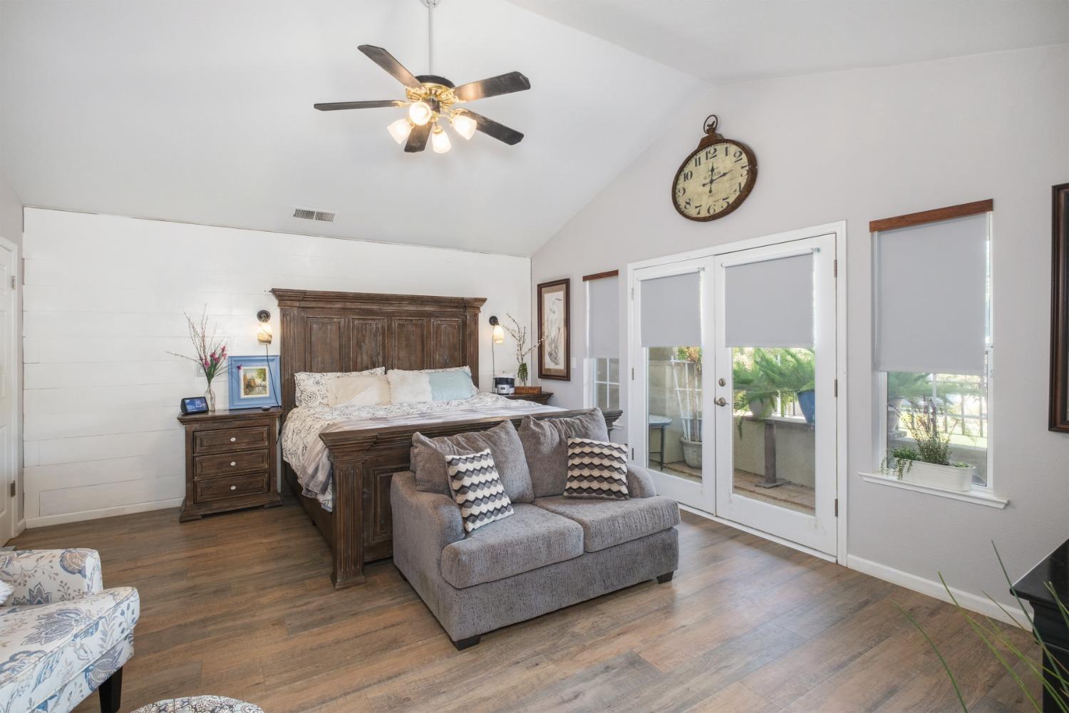 452 Omaha Avenue Clovis, CA 93619 - Photo 19 of 33 a living room with furniture and a clock