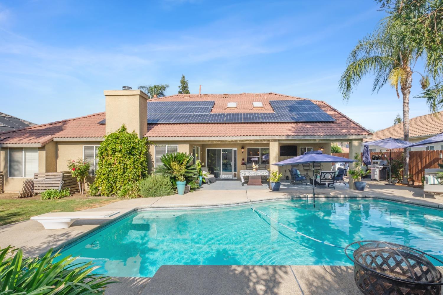 452 Omaha Avenue Clovis, CA 93619 - Photo 28 of 33 a front view of a house with garden