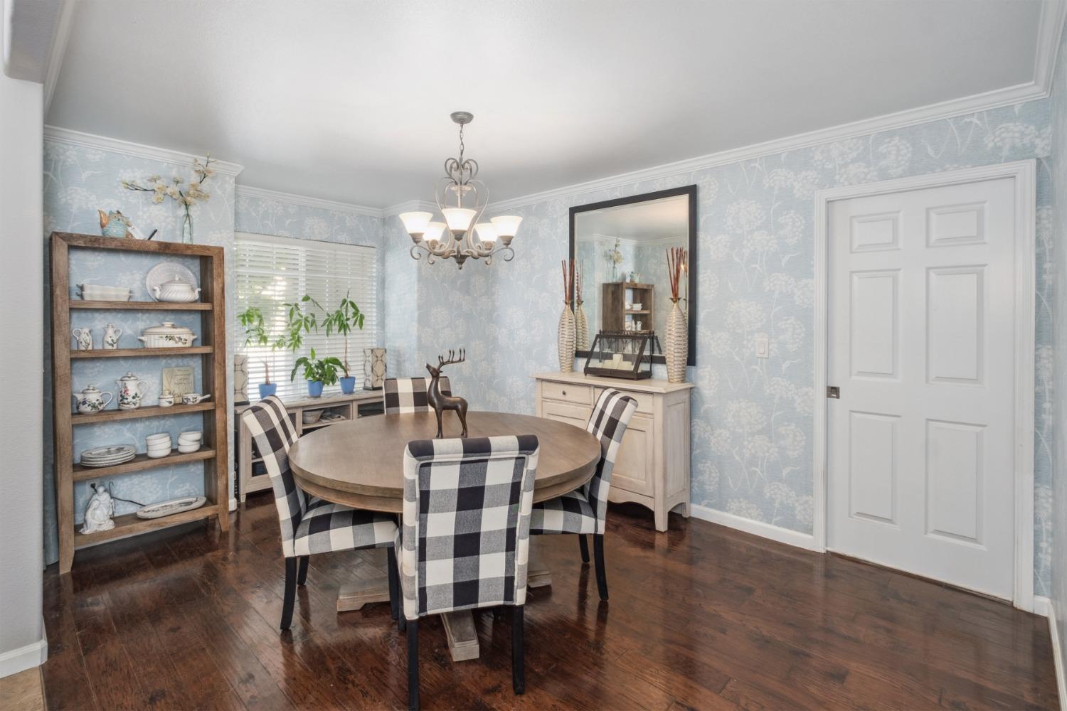 452 Omaha Avenue Clovis, CA 93619 - Photo 8 of 33 a view of a dining room with furniture and wooden floor