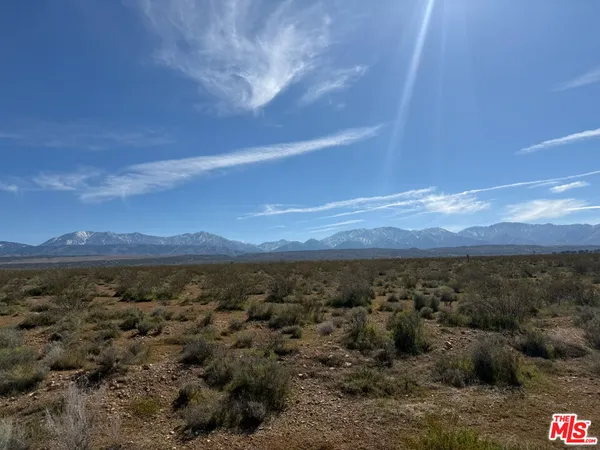 a view of an outdoor space with mountain view