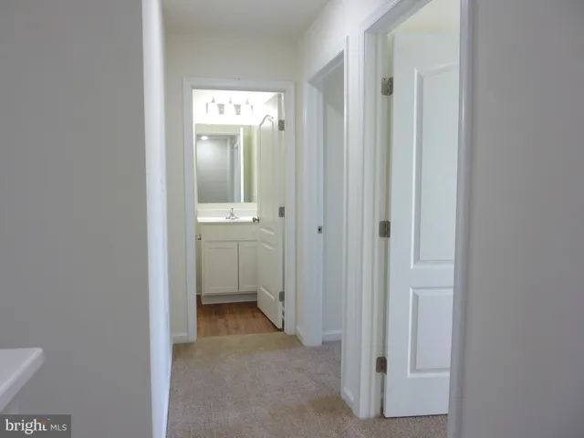 a view of a bathroom with toilet