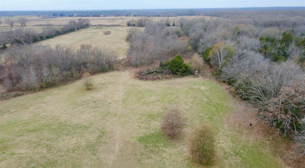 2425 County Road 2425 Como, TX 75431 - Photo 6 of 11 Drone / aerial view with a rural view