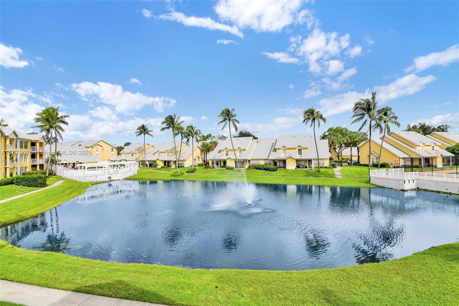 6340 La Costa Drive, Unit B Boca Raton, FL 33433 - Photo 15 of 16 a view of a lake with houses
