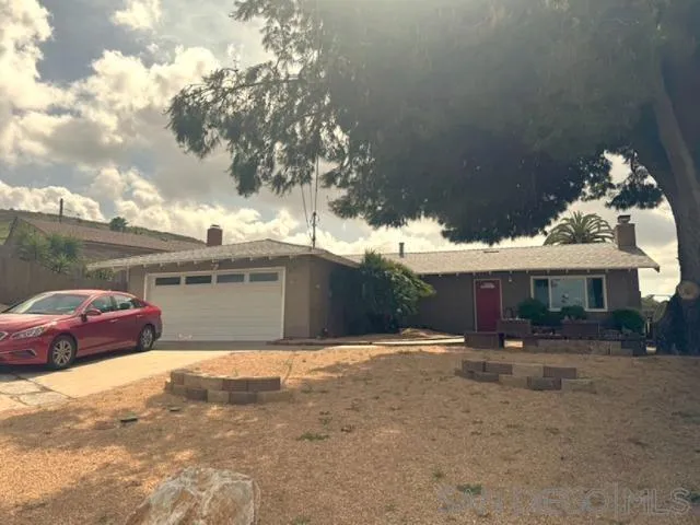 12710 Montauk Street Poway, CA 92064 - Photo 26 of 51 a view of a house with a snow in the yard