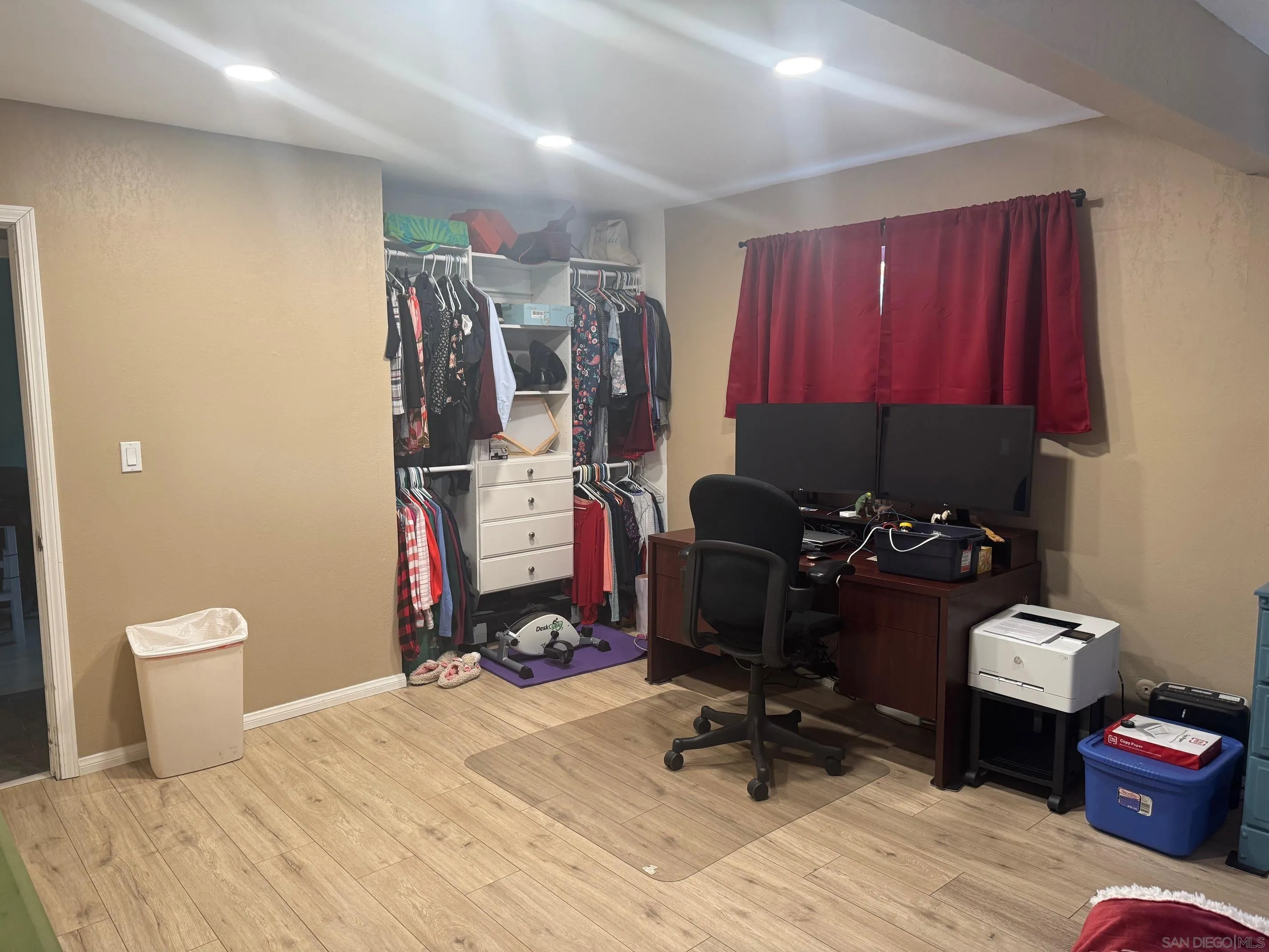 12710 Montauk Street Poway, CA 92064 - Photo 34 of 51 a view of a workspace with furniture and gym equipment