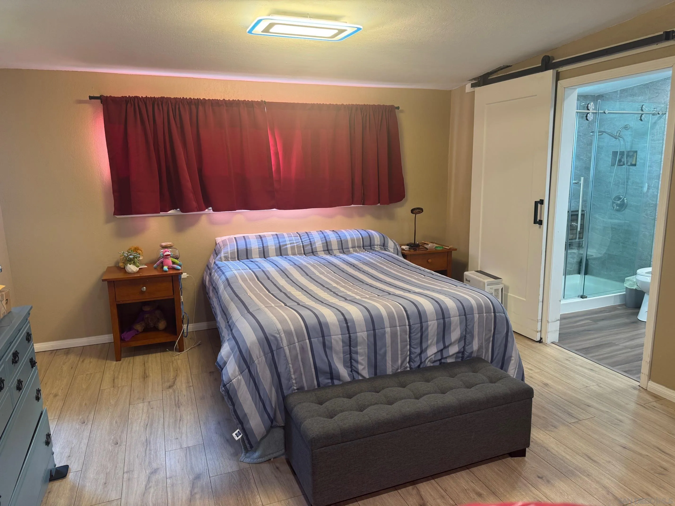 12710 Montauk Street Poway, CA 92064 - Photo 36 of 51 a bedroom with a bed and a dresser