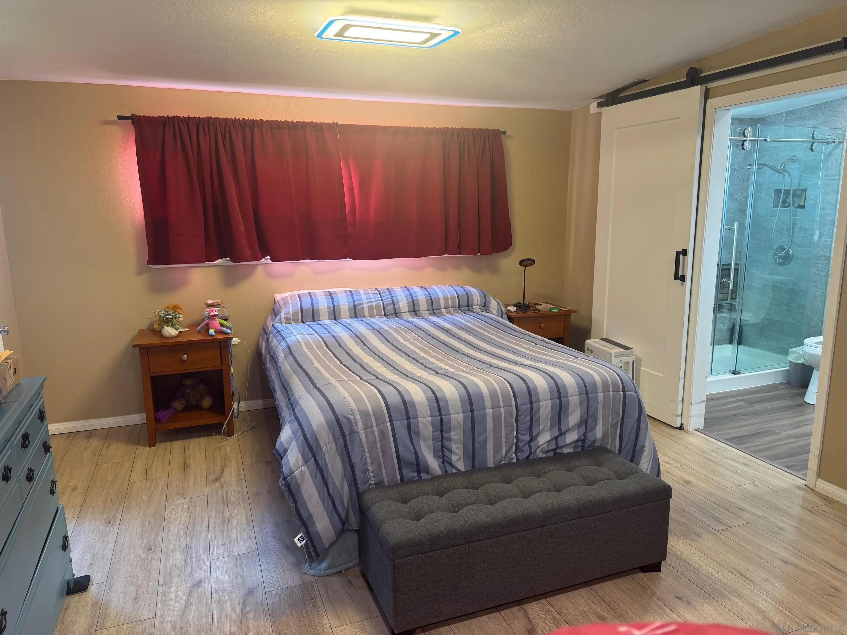 12710 Montauk Street Poway, CA 92064 - Photo 37 of 51 a bedroom with a bed and a dresser