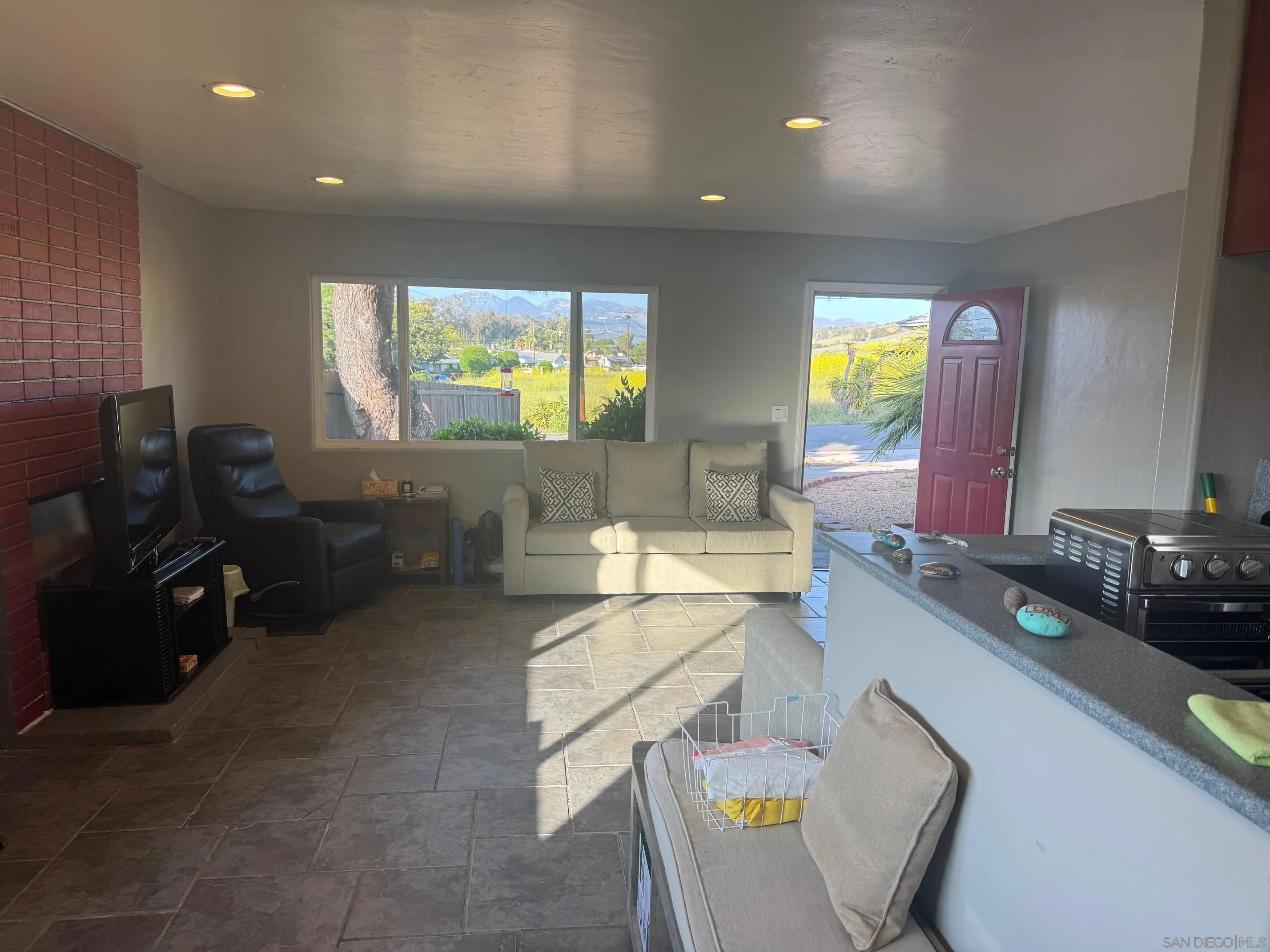 12710 Montauk Street Poway, CA 92064 - Photo 43 of 51 a living room with furniture and a flat screen tv
