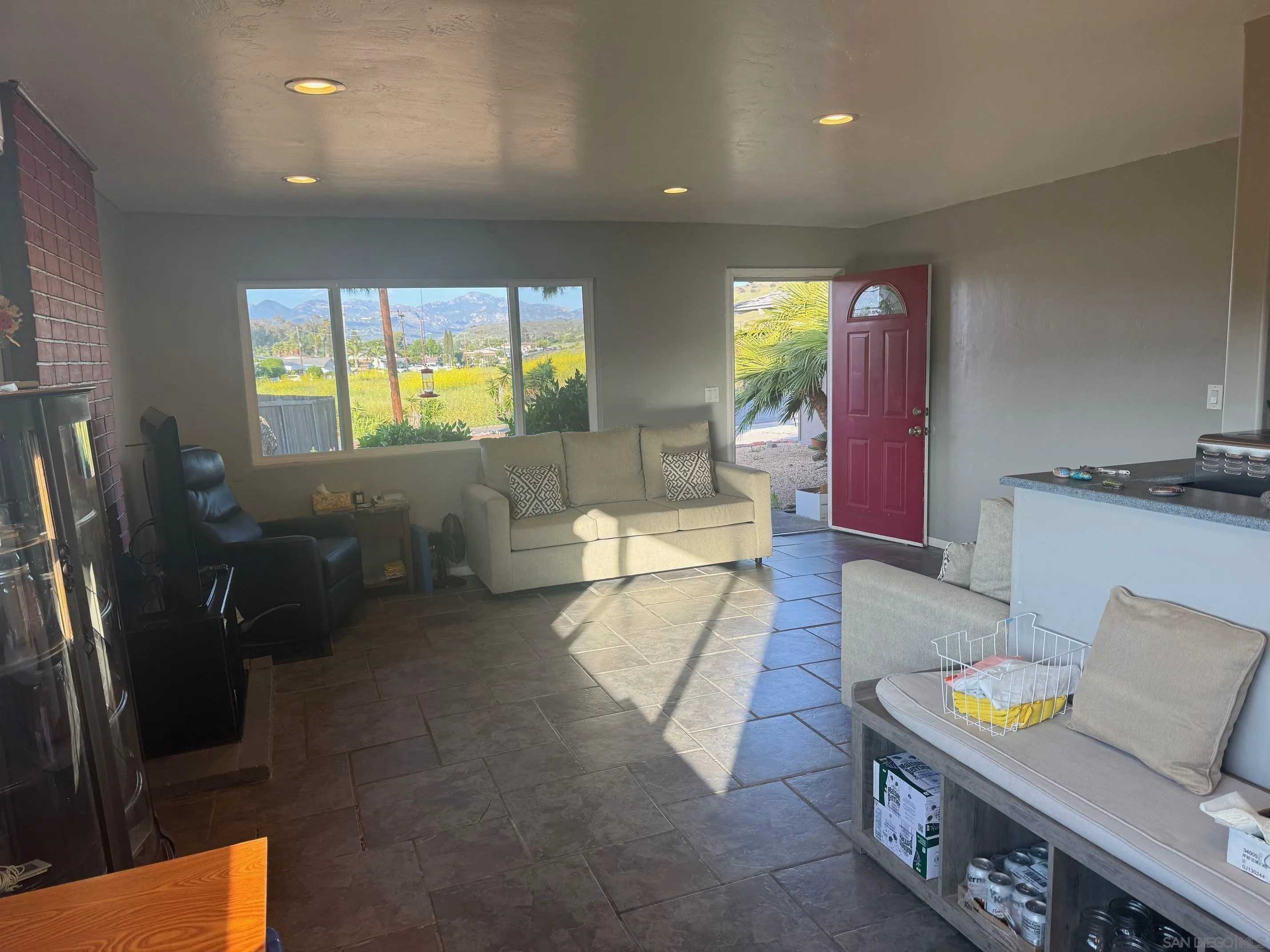 12710 Montauk Street Poway, CA 92064 - Photo 44 of 51 a living room with furniture and a flat screen tv
