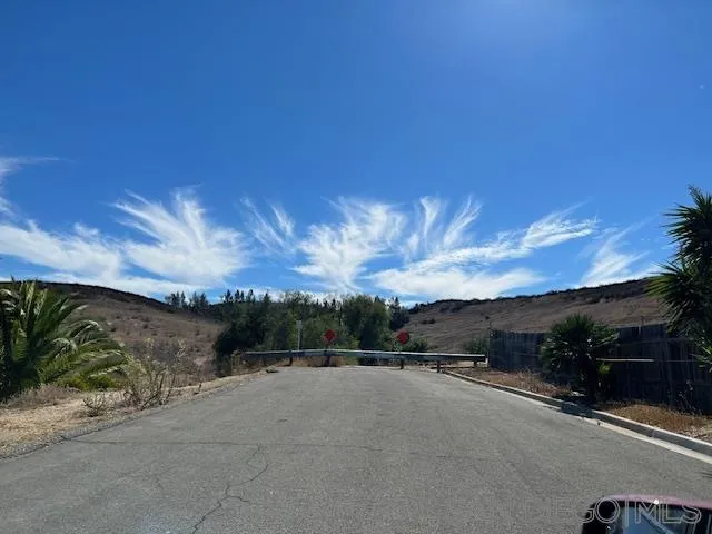 12710 Montauk Street Poway, CA 92064 - Photo 50 of 51 a view of a street with a building in the background