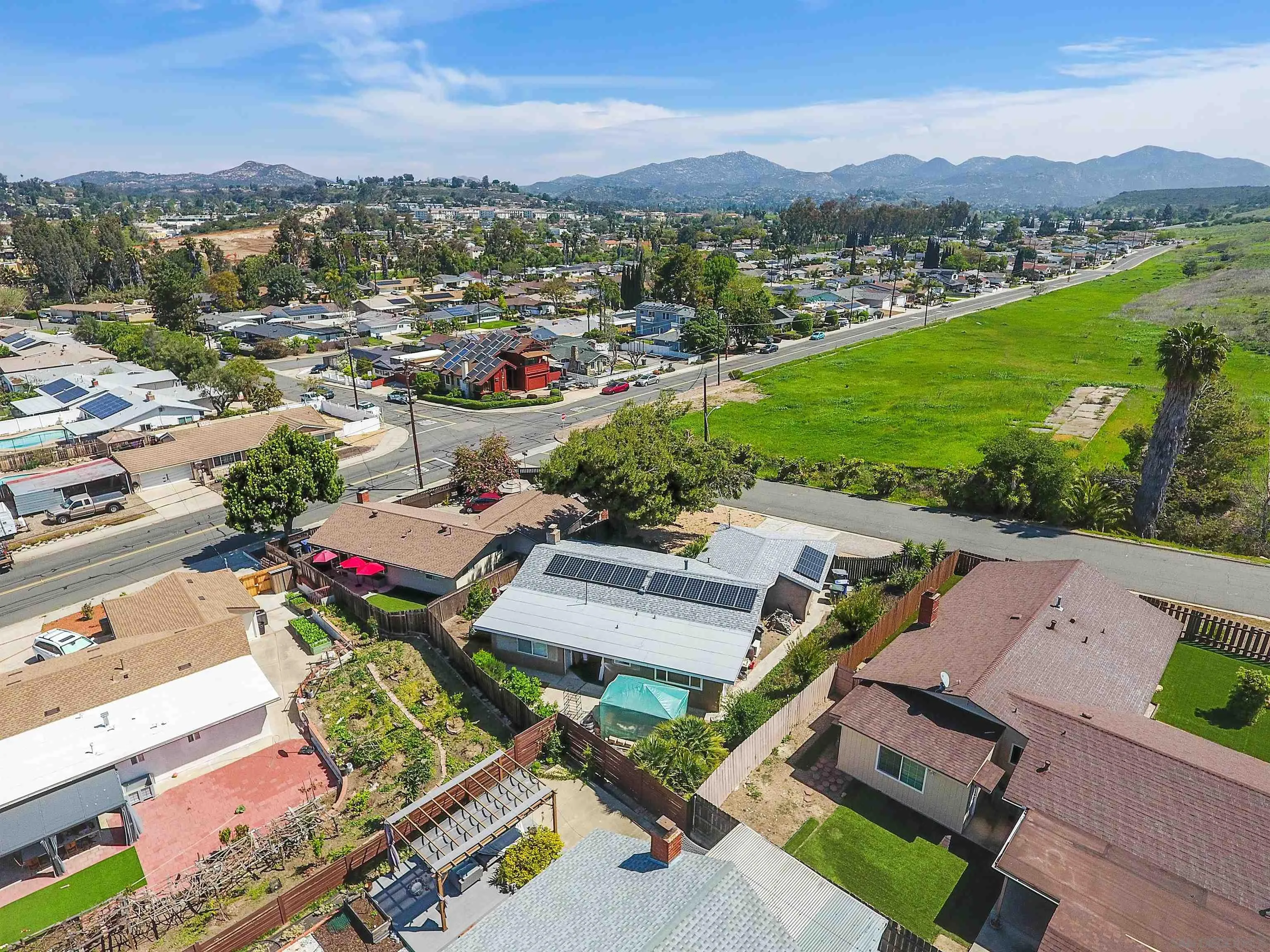 12710 Montauk Street Poway, CA 92064 - Photo 6 of 51 an aerial view of a city with lots of residential buildings