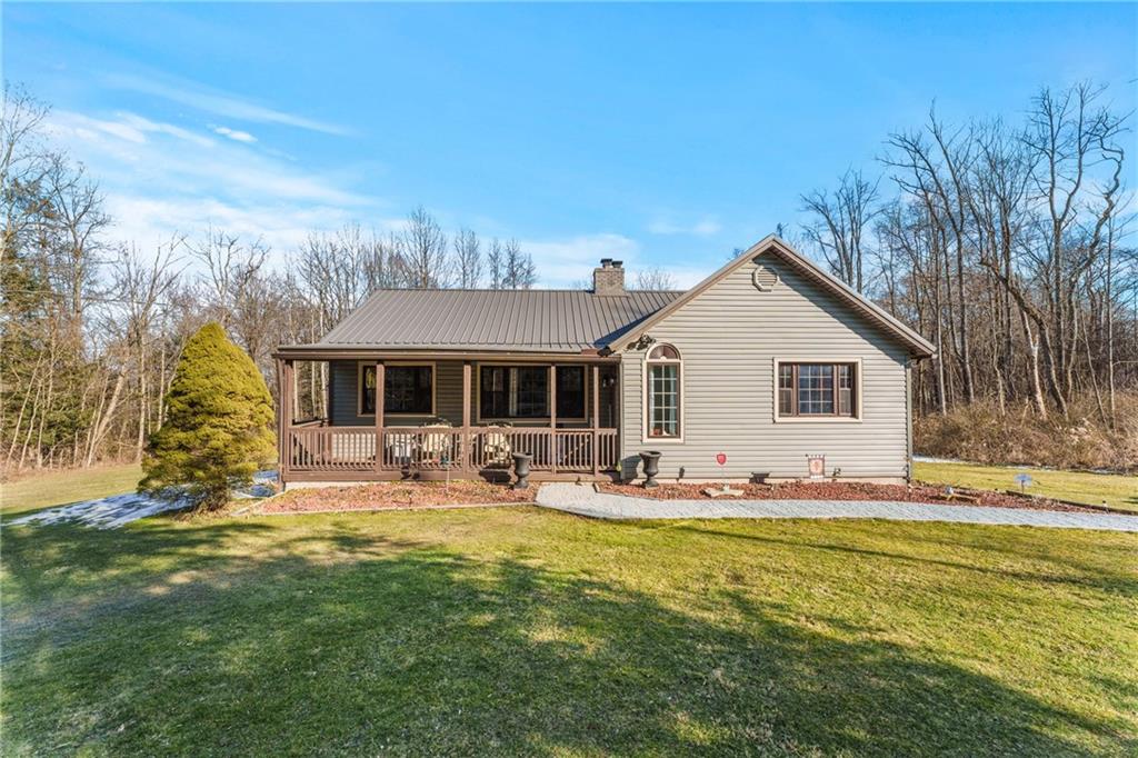 3370 Mercer Road New Castle, PA 16105 - Photo 1 of 25 a view of a house with backyard and sitting area