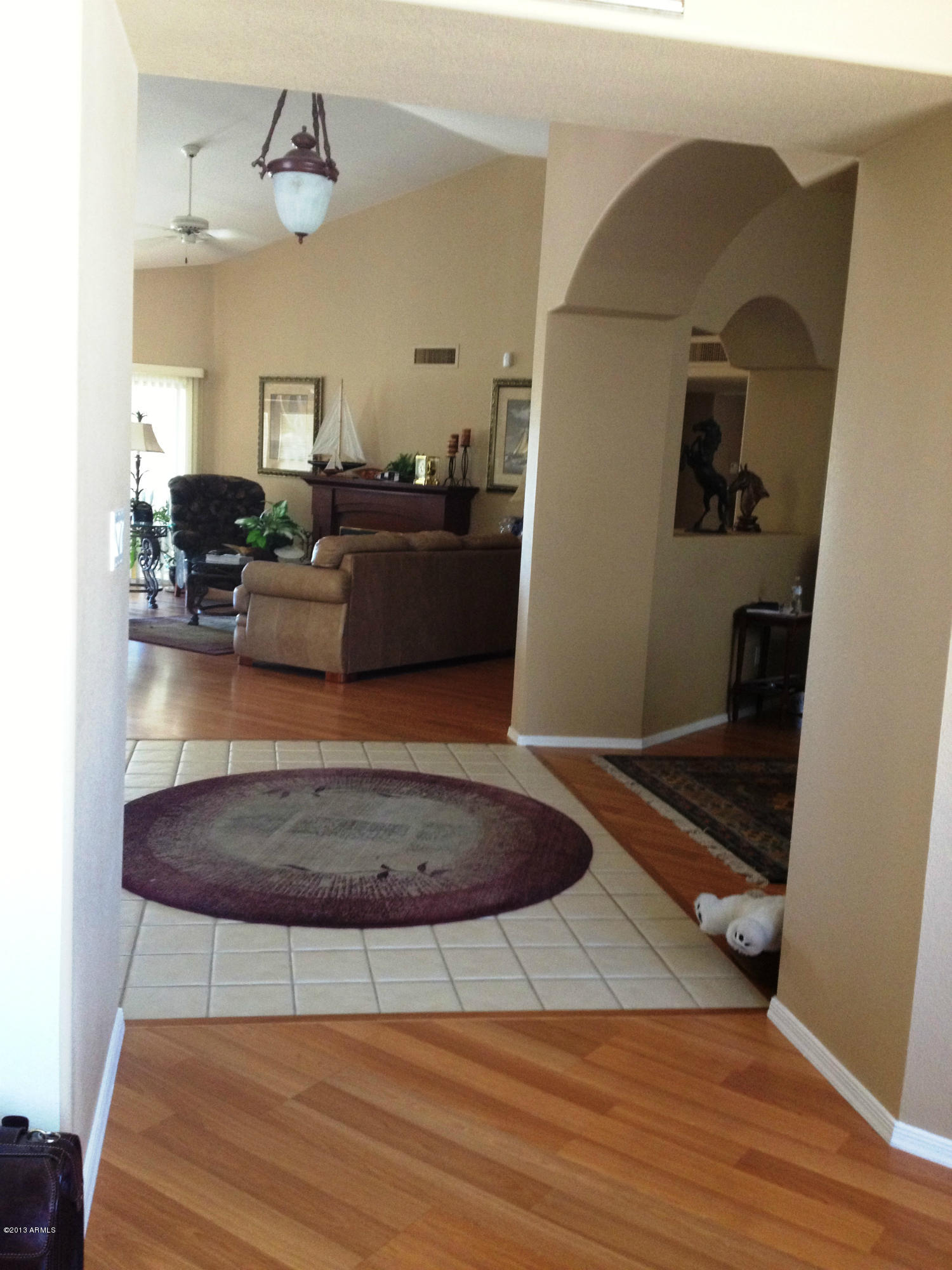 14643 West Raindance Road Surprise, AZ 85374 - Photo 6 of 12 CUSTOM PAINT / HARDWOOD FLOORS