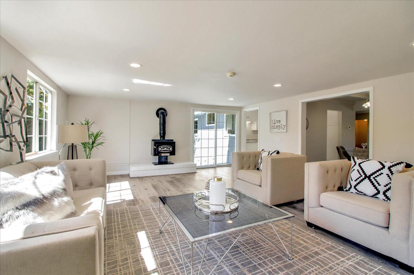 1693 Beck Drive San Jose, CA 95130 - Photo 11 of 37 a living room with furniture and a couch