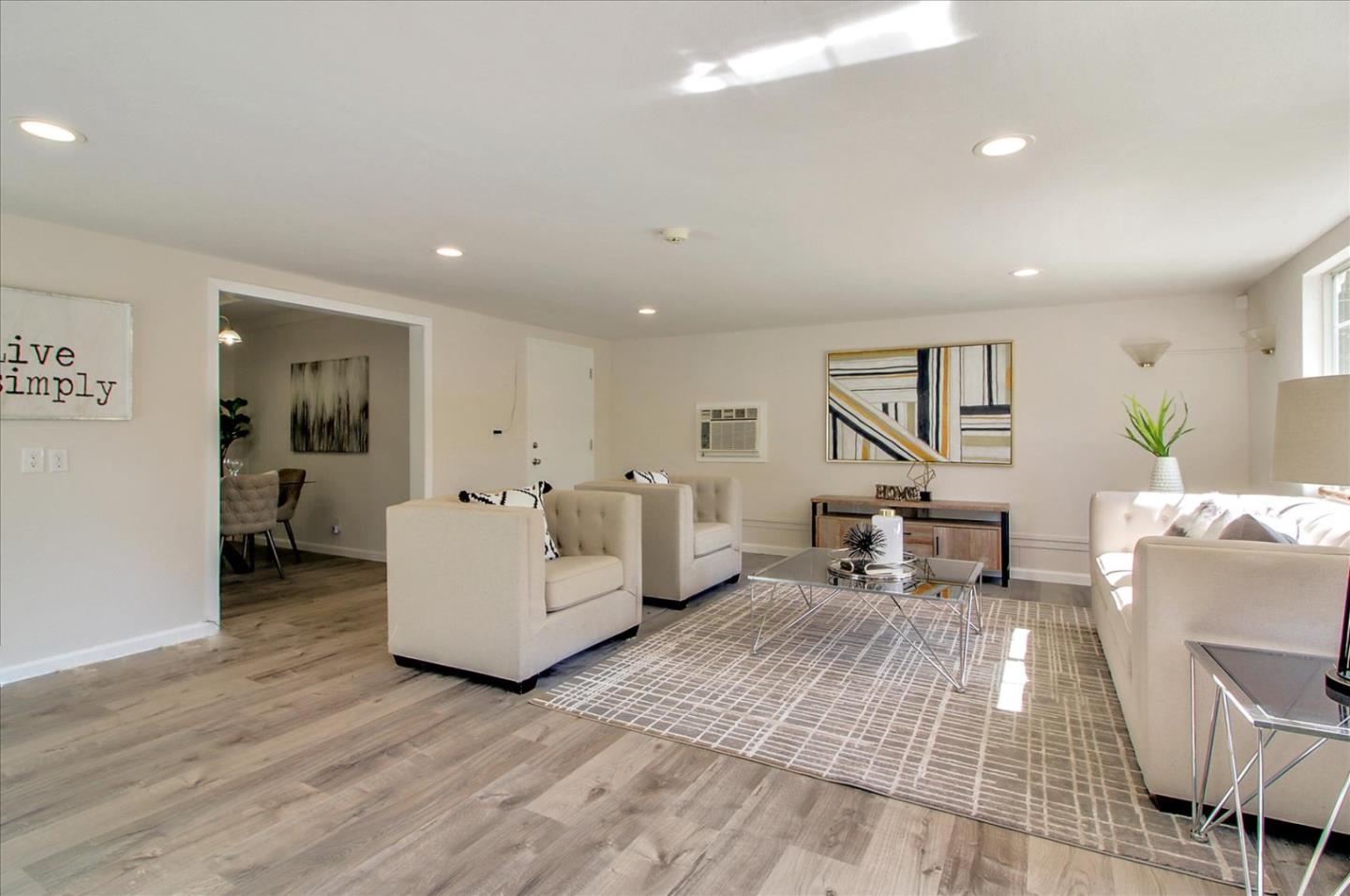 1693 Beck Drive San Jose, CA 95130 - Photo 12 of 37 a living room with furniture and a wooden floor