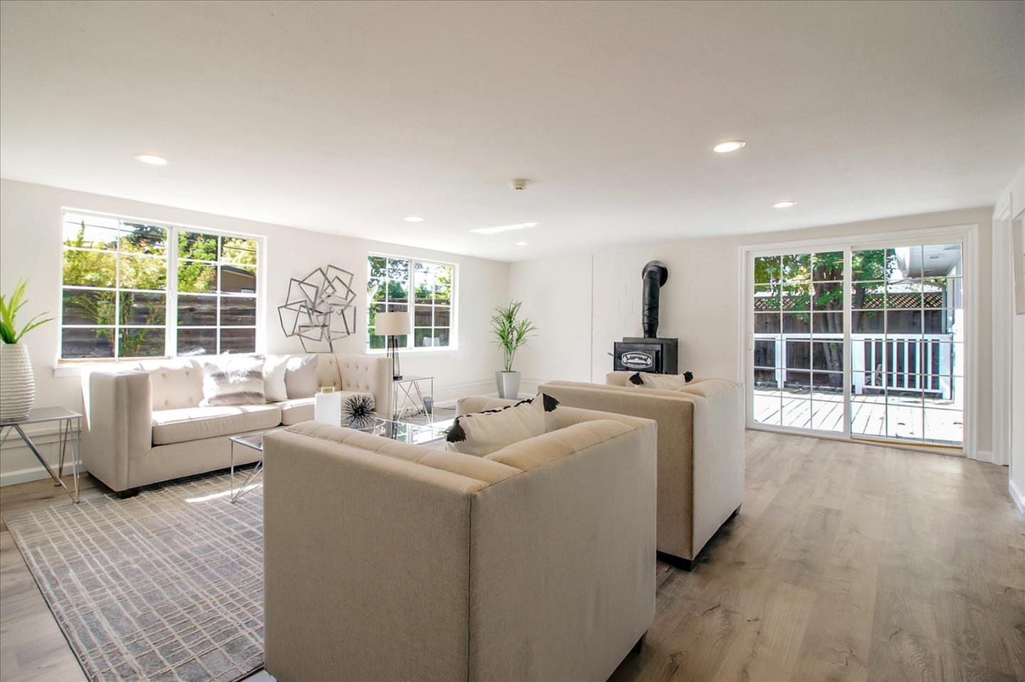 1693 Beck Drive San Jose, CA 95130 - Photo 14 of 37 a living room with furniture and a large window