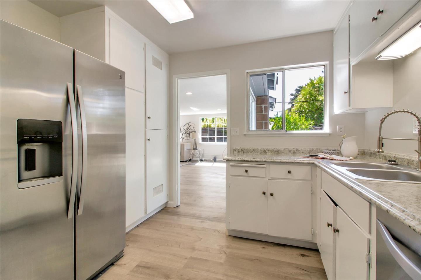 1693 Beck Drive San Jose, CA 95130 - Photo 15 of 37 a kitchen with a refrigerator sink and cabinets