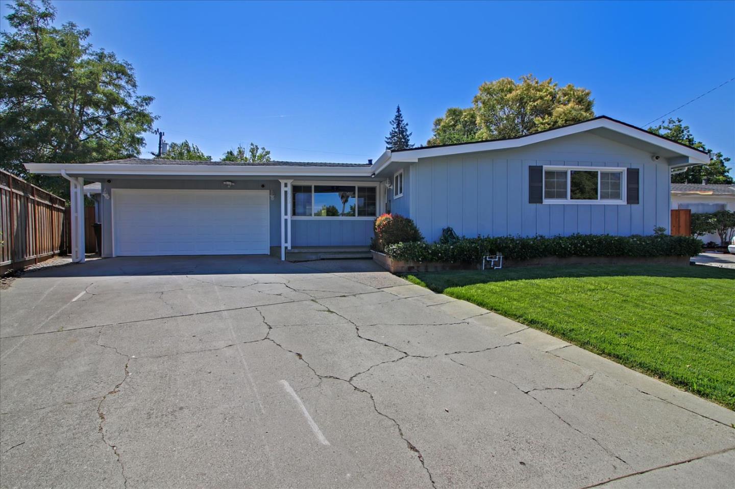 1693 Beck Drive San Jose, CA 95130 - Photo 2 of 37 a front view of house with yard and trees