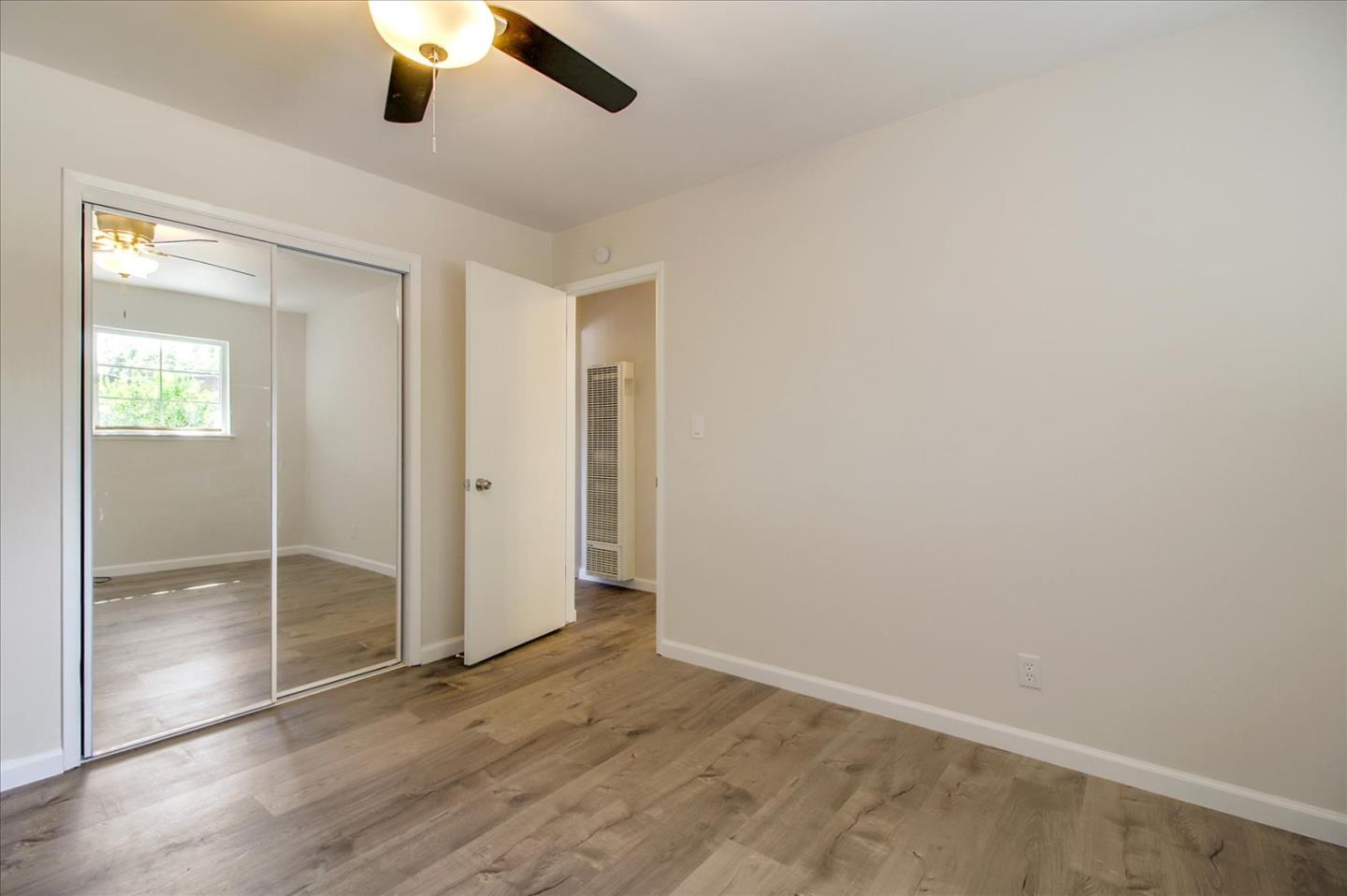 1693 Beck Drive San Jose, CA 95130 - Photo 27 of 37 wooden floor in an empty room