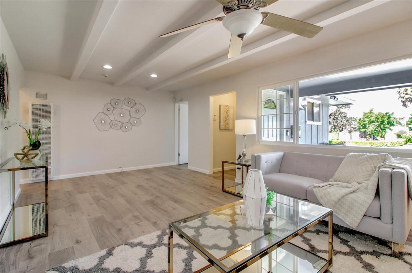 1693 Beck Drive San Jose, CA 95130 - Photo 7 of 37 a living room with furniture and a large window