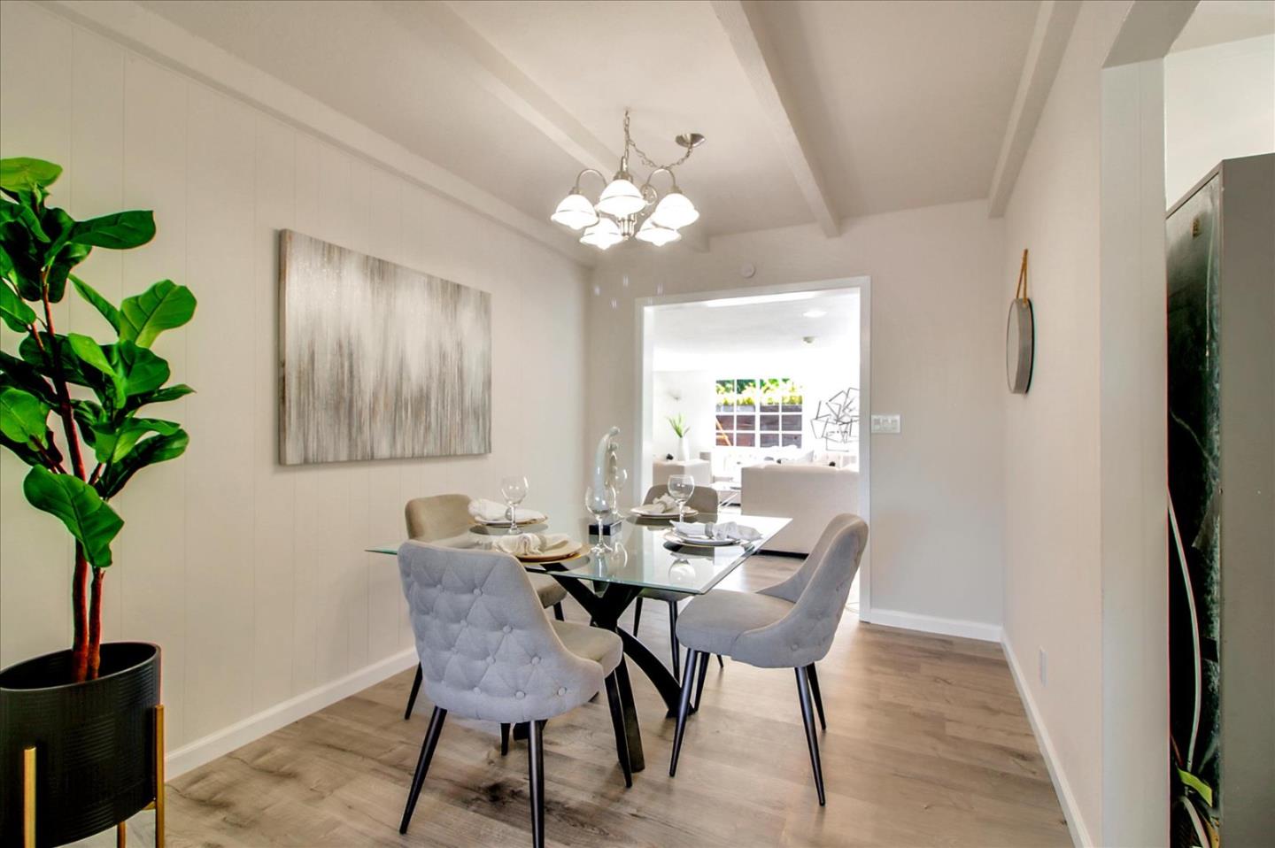 1693 Beck Drive San Jose, CA 95130 - Photo 9 of 37 a view of a dining room with furniture window and wooden floor