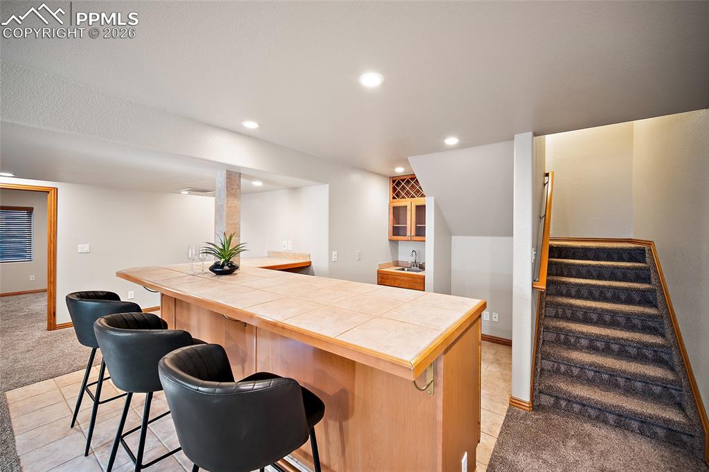 7612 Bullet Road Peyton, CO 80831 - Photo 36 of 50 Wet bar in family room.