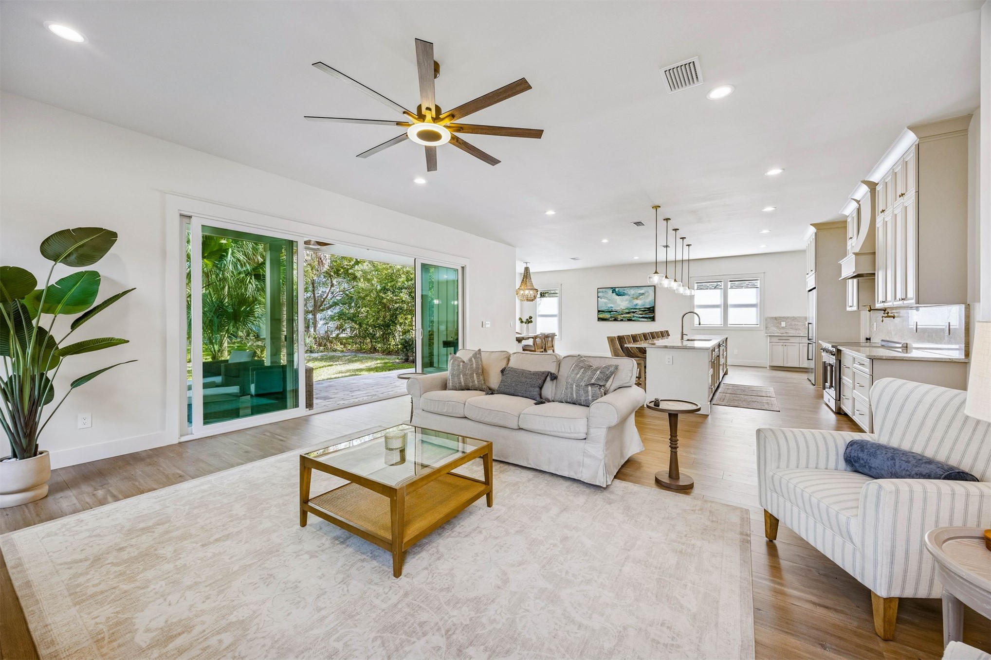 424 South 3rd Street Fernandina Beach, FL 32034 - Photo 10 of 38 a living room with furniture and a large window