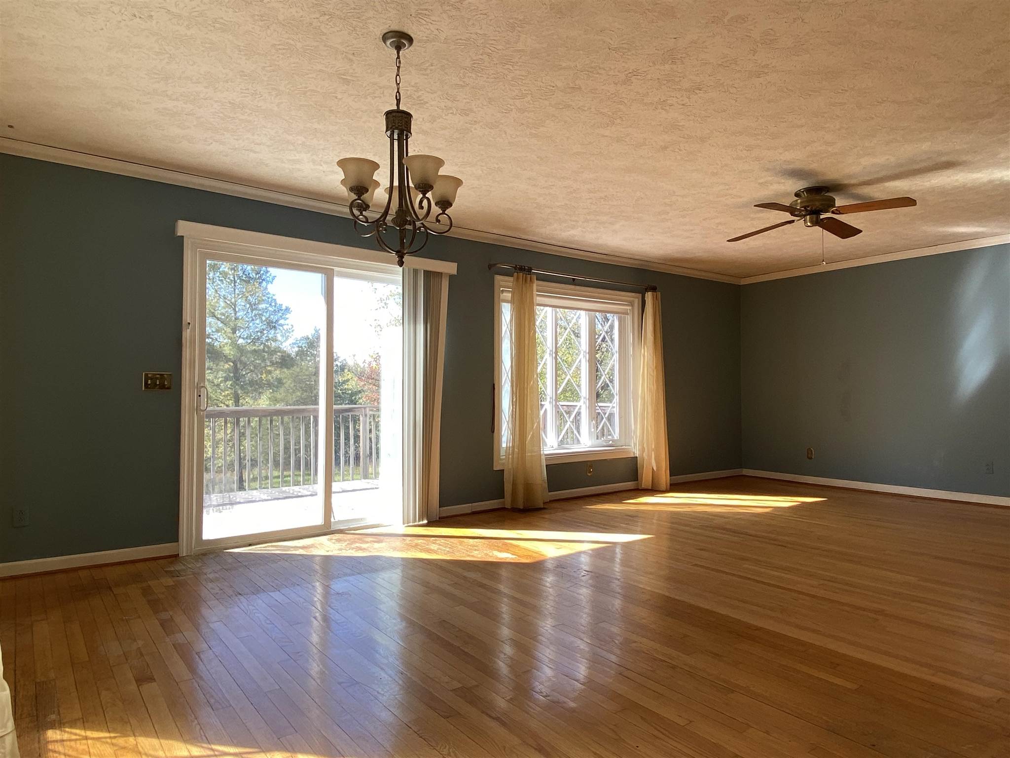 1773 Roman Road Mount Sidney, VA 24467 - Photo 18 of 45 a view of an empty room with wooden floor and a window