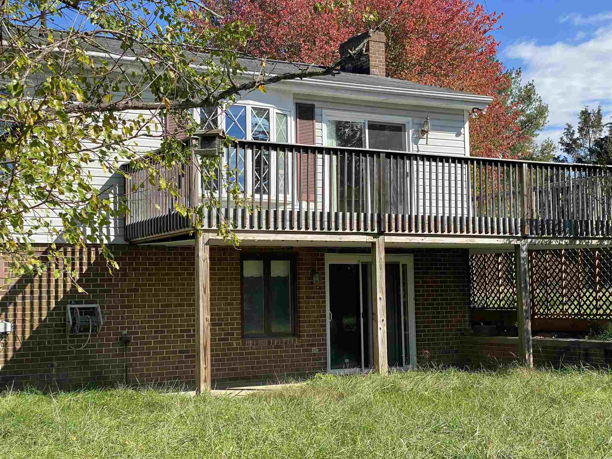1773 Roman Road Mount Sidney, VA 24467 - Photo 2 of 45 a front view of a house with a garden