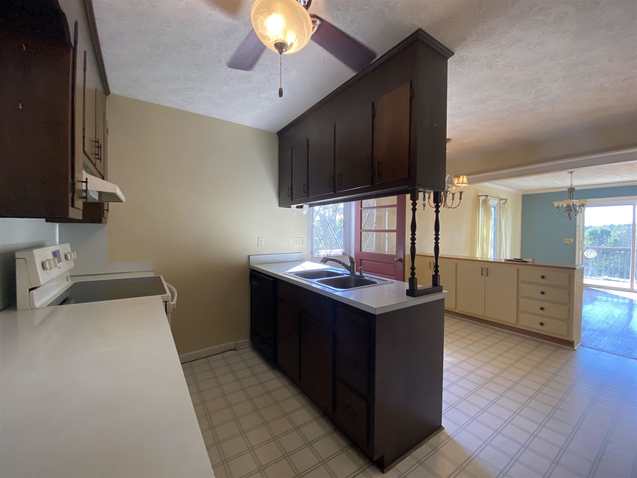 1773 Roman Road Mount Sidney, VA 24467 - Photo 22 of 45 a kitchen with a sink and cabinets