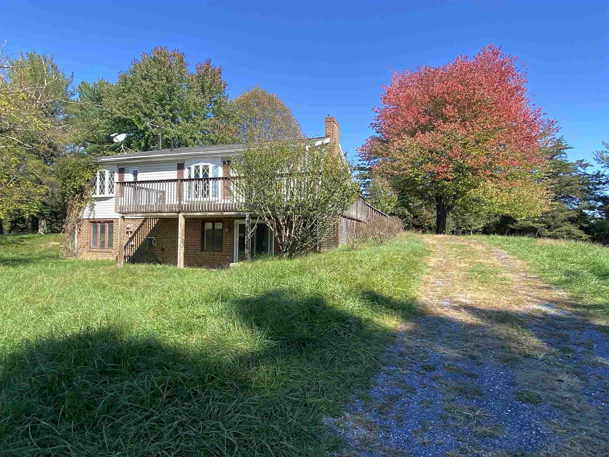 1773 Roman Road Mount Sidney, VA 24467 - Photo 3 of 45 a view of a big yard with plants and large trees