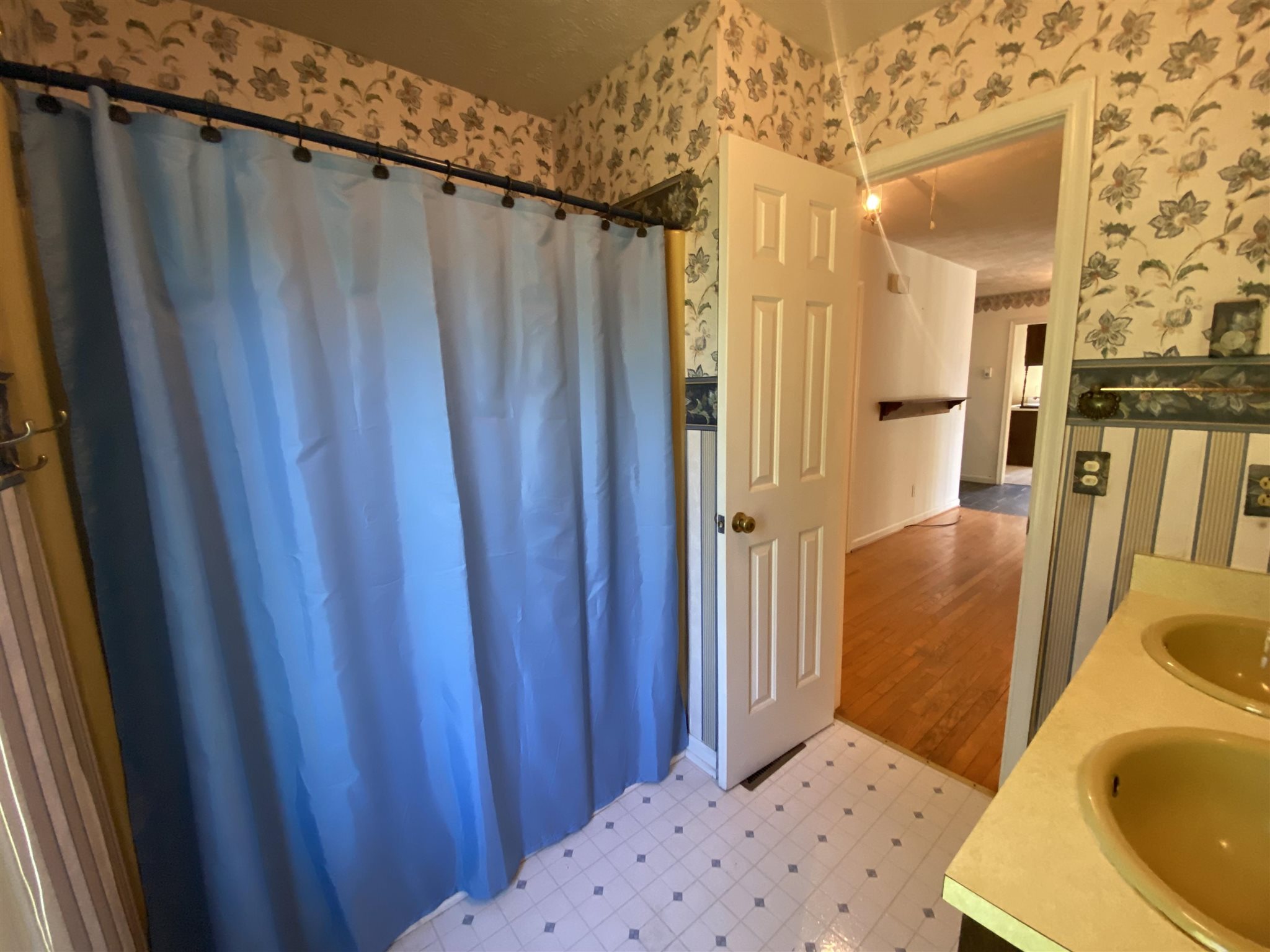 1773 Roman Road Mount Sidney, VA 24467 - Photo 32 of 45 a bedroom with a bed and wooden floor