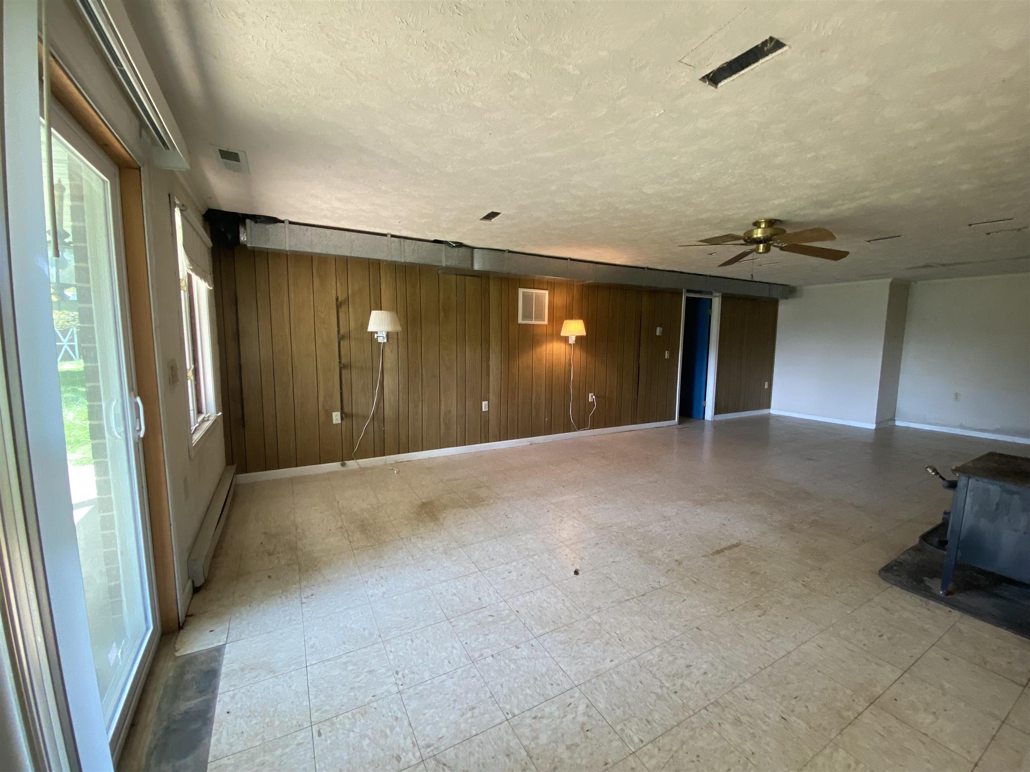 1773 Roman Road Mount Sidney, VA 24467 - Photo 36 of 45 a view of a livingroom with a staircase