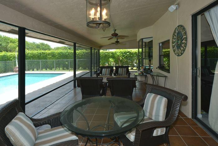 11798 Island Lakes Lane Boca Raton, FL 33498 - Photo 6 of 24 11798 islanmd lakes patio1_700